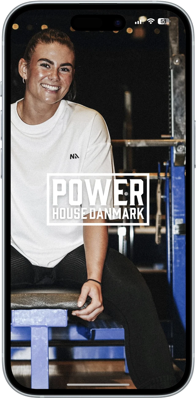 Power House Danmark-appens forside vist på en telefon